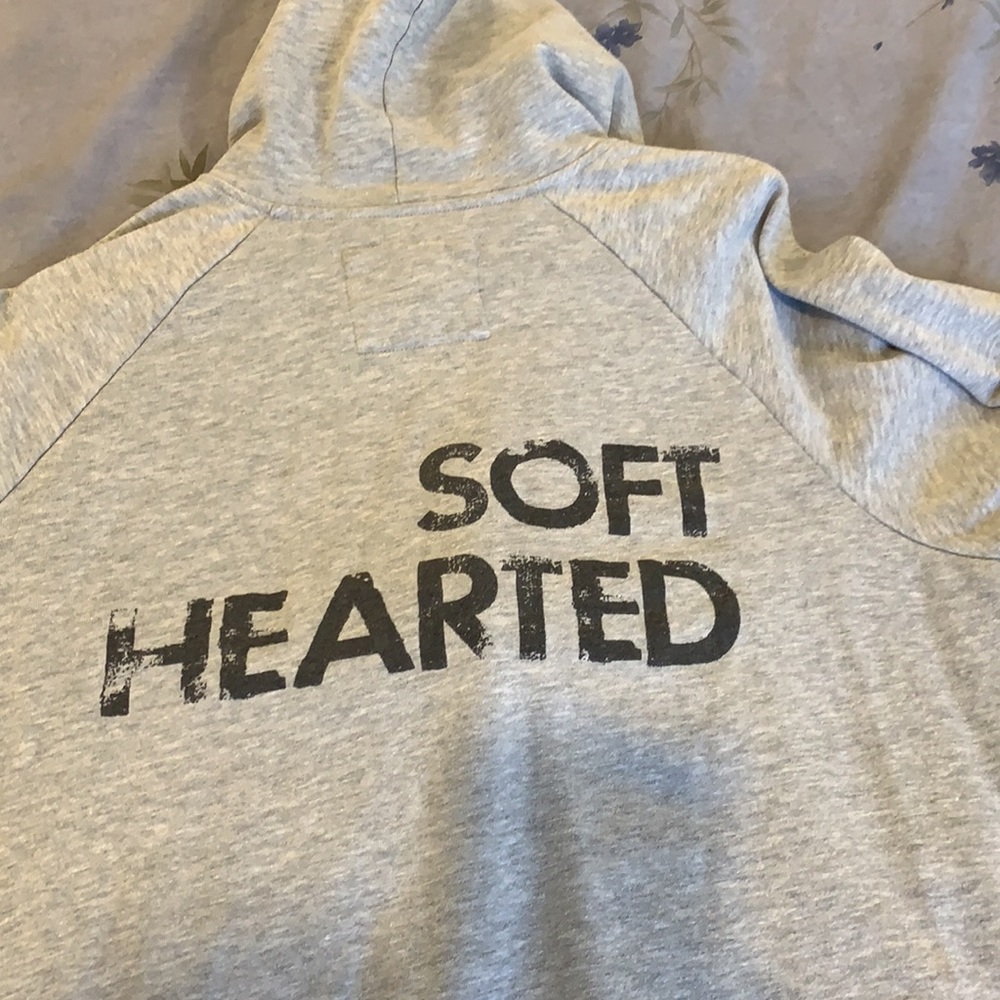 Gray Peace Love World zip up sweatshirt with writing on the back “Soft Hearted”